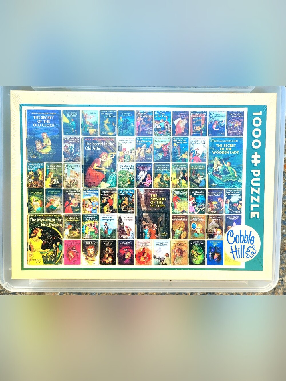 Cobb Hill by New Balance Blue 1000-Piece Classic Mystery Covers Puzzle
